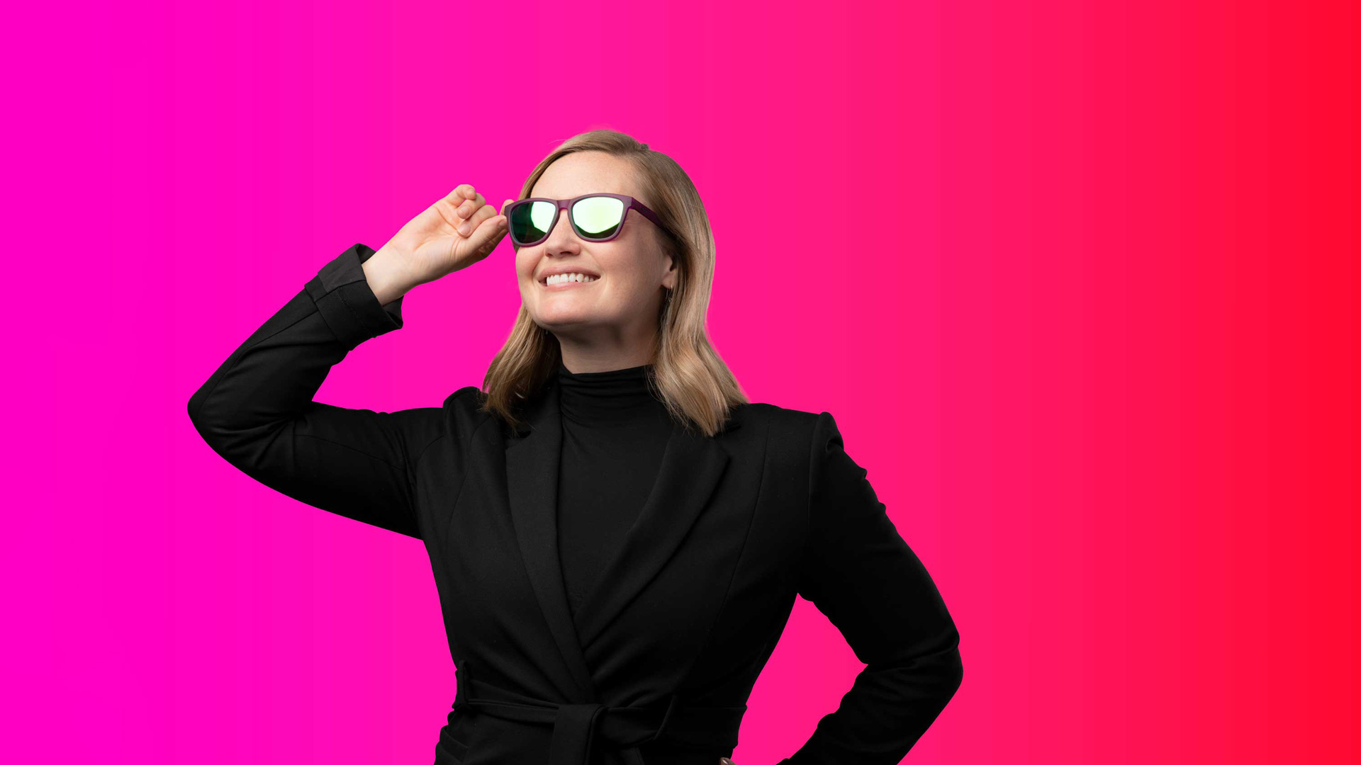 Woman posing looking up with sunglasses